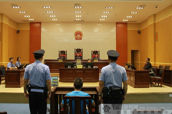 柳州市人民政府原秘书长沈震受贿案一审宣判